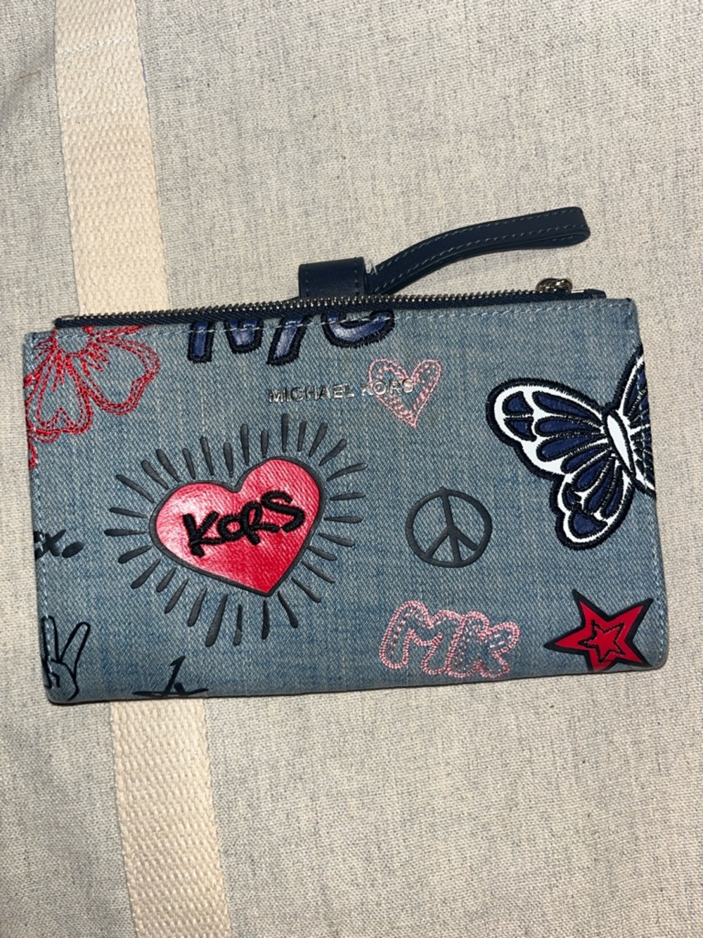 Michael Kors Denim Wristlet with Red and Pink Patch Accents - Picture 2 of 7